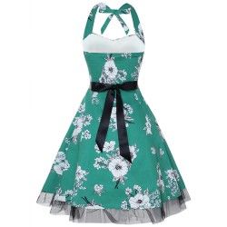 Vintage dress tied to the green neck with white flowers