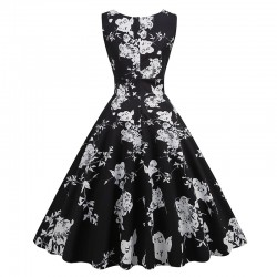 Vestido vintage negro con flores blancas