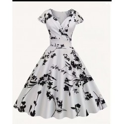 Vestido vintage blanco con estampado floral negro